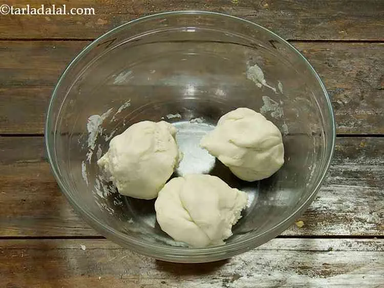 Step 10 – Deflate the dough and divide the dough into 3 equal portions.