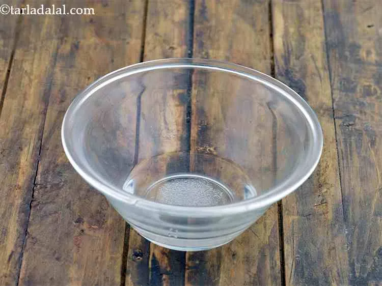 Step 1 – To make the <strong>Indian naan pizza</strong> base, combine the sugar and 5 tbsp of lukewarm …