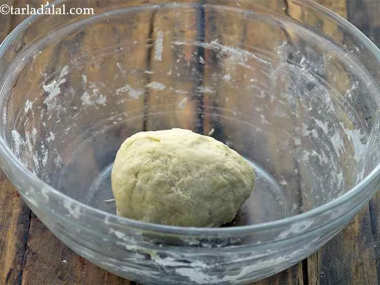 Step 7 – Knead it into a soft dough using enough lukewarm water. Use little ghee at the …