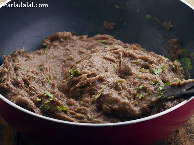 Step 17 – Mix well and our&nbsp;<strong>nachni khichu recipe | ragi khichu | Gujarati&nbsp;nachni khichu | healthy red …