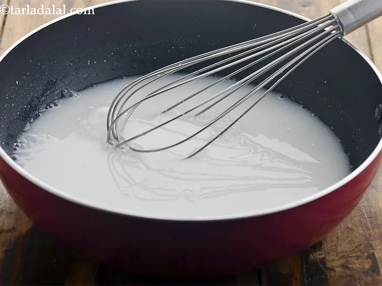 Step 4 – Boil this mixture on a medium flame. Whisk well to ensure that there are no …