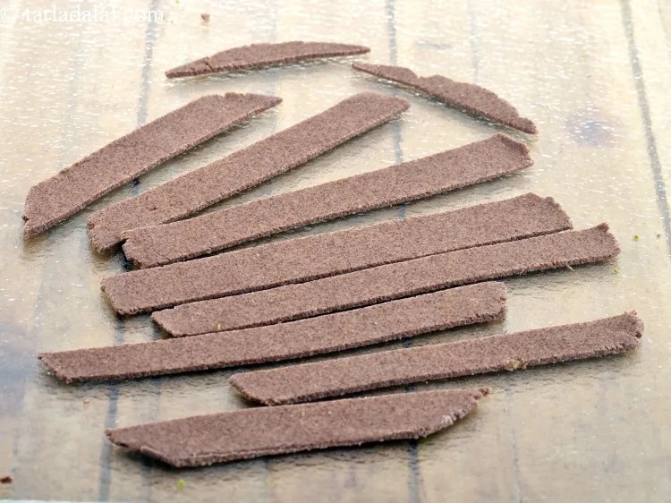 Step 8 – Cut each circle into 8 equal size long strips and keep aside. You will get …