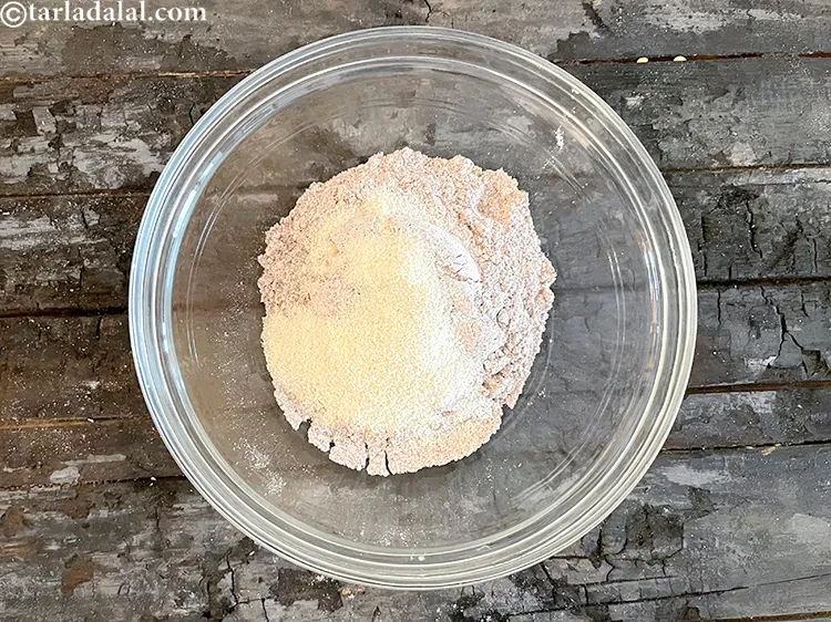 Step 12 – Add&nbsp;<meta charset="UTF-8" />1 tbsp&nbsp;<a href="glossary-semolina-sooji-rava-rawa-603i">semolina (rava)</a>.