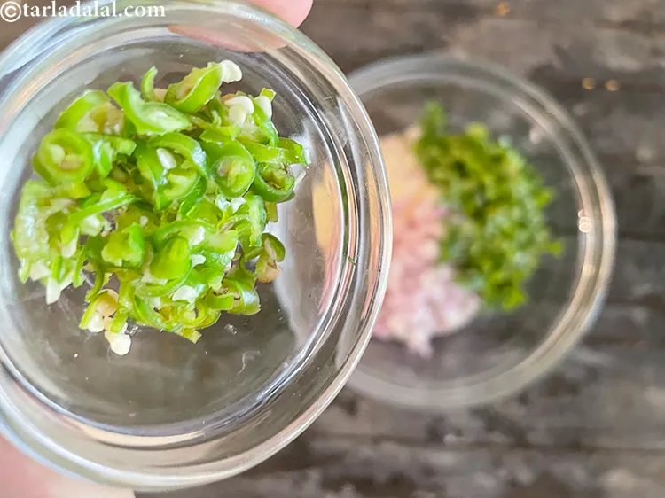 Step 16 – Add&nbsp;<meta charset="UTF-8" />1 1/2 tsp&nbsp;finely&nbsp;<a href="glossary-chopped-green-chilli-820i">chopped green chillies</a>.