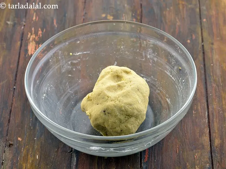 Step 10 – Once the dough is kneaded well, divide it into 3 equal portions and roll each …