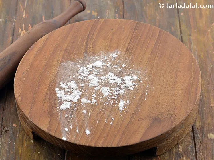 Step 11 – Sprinkle a little flour on the rolling board so that it is easier to roll …