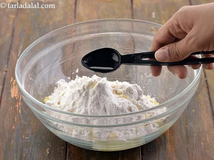 Step 4 – Now add the oil. Adding the oil to the dough results in crisp nacho chips.