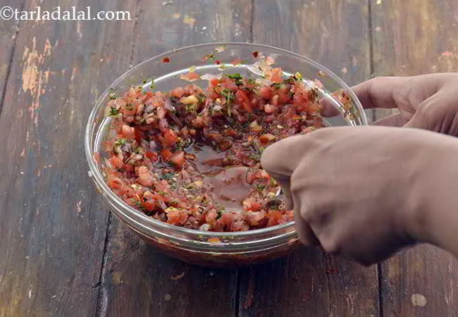 Step 11 – Mix well with the back of a spoon, while mashing lightly.&nbsp;Keep aside for 30 minutes …