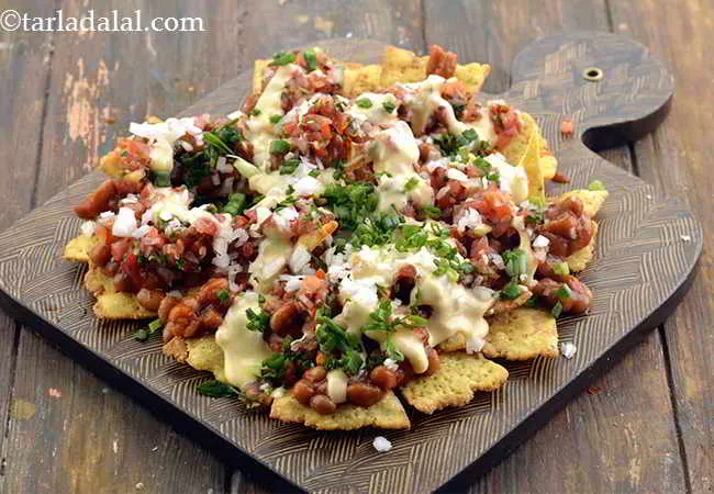 Step 21 – Also sprinkle 1 tbsp of spring onion greens over it.