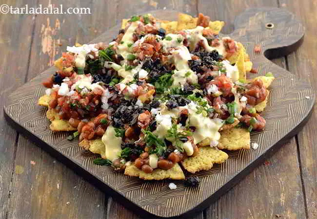 Step 22 – Sprinkle 1 tbsp of olives over the spring onions. This will add a little zingyness …