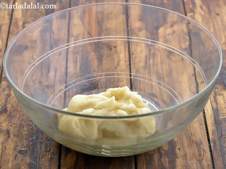 Step 6 – In another deep bowl, take the ghee. The ghee should not me melted; it should …