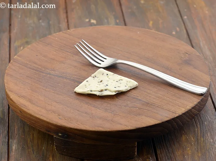 Step 34 – Pricking helps to prevent the nimki from puffing up while frying and this makes it …