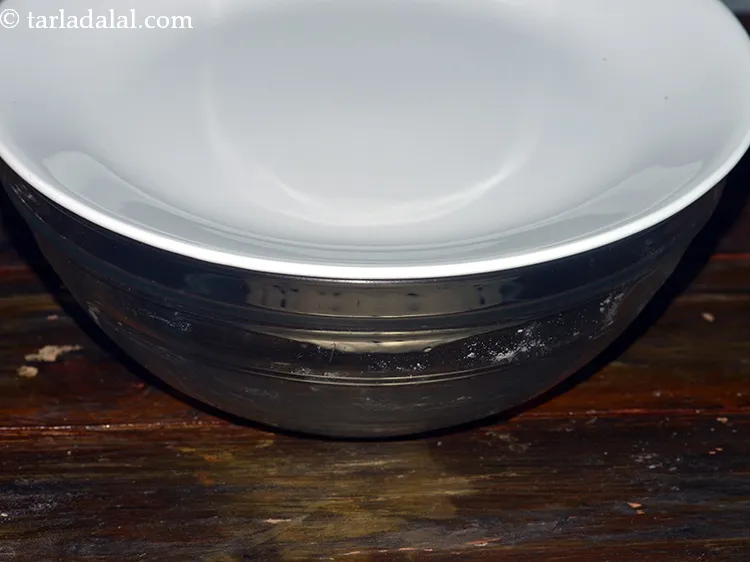 Step 18 – Cover the dough with a lid and keep aside for 30 minutes.