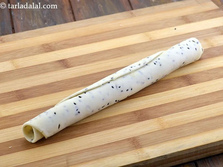 Step 24 – Start rolling tightly from one end to another end like a wrap.