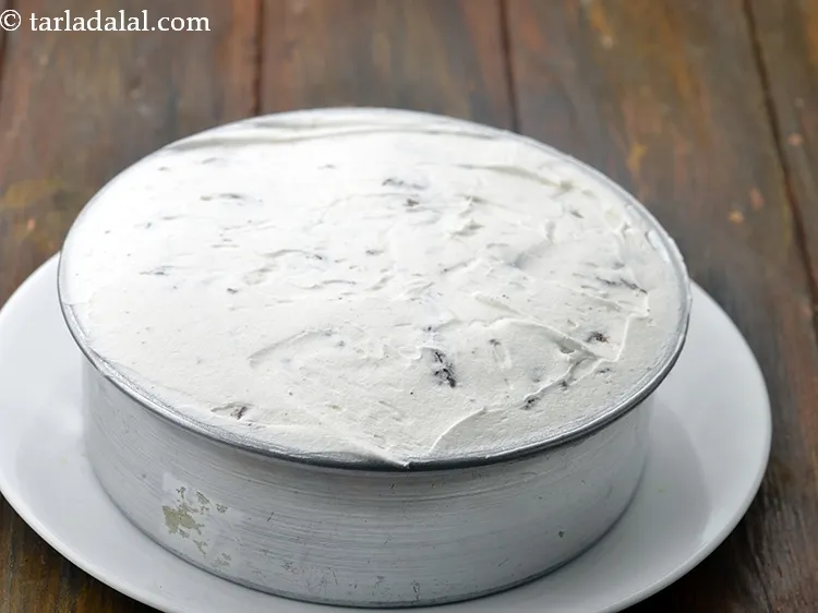 Step 18 – Pour this mixture on the biscuit base in the loose bottom cake tin and spread …