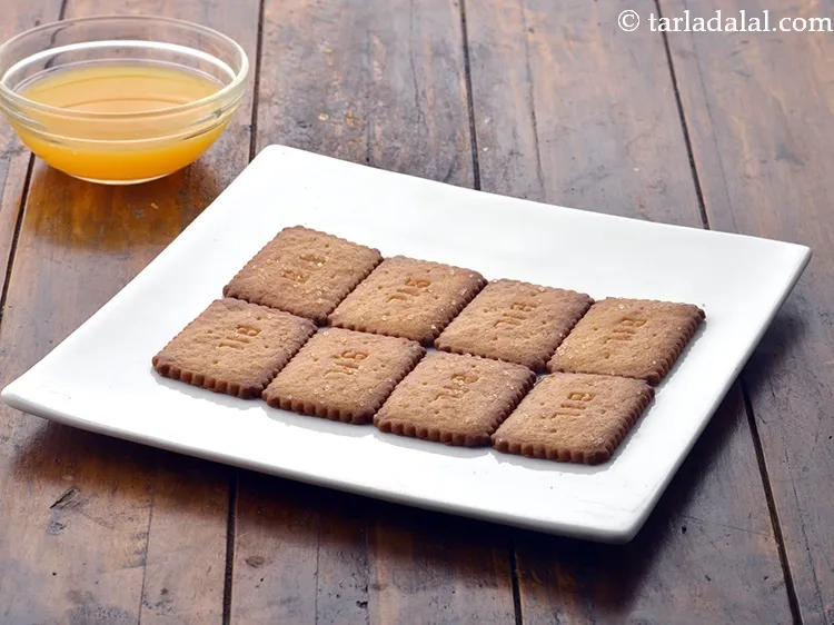 Step 21 – Dip the biscuit in orange juice and remove immediately, else it might break.