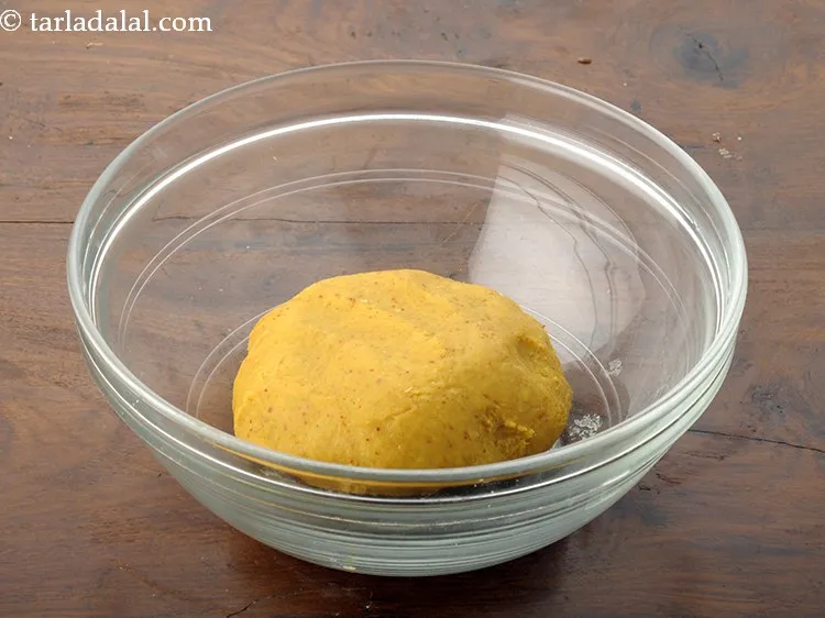 Step 12 – Mix well and knead into a soft dough using enough water. Remember to add the …