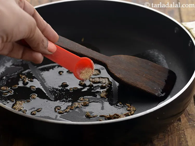 Step 4 – When the seeds crackle, add asafoetida. This will aid in digestion as kurmura produces intestinal …