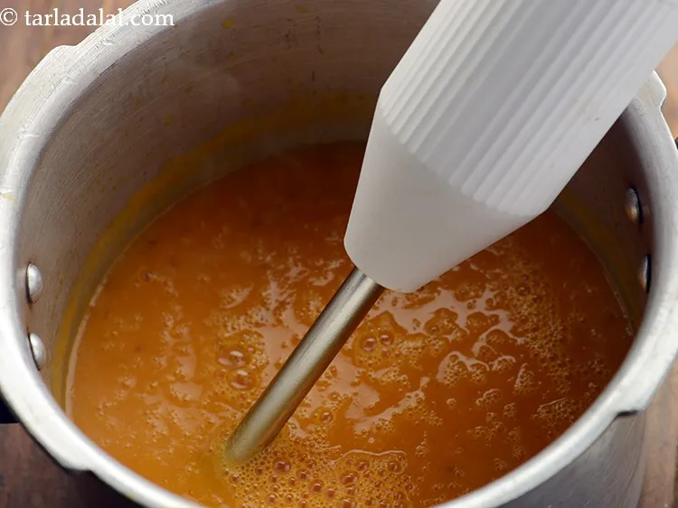 Step 13 – Cool them slightly and transfer into a mixer jar. Blend the mixture in a mixer …