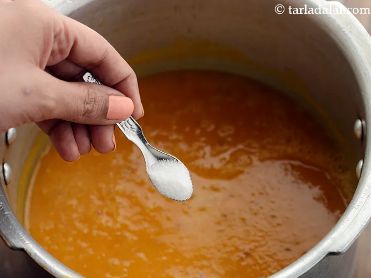 Step 15 – Add the salt, mix well and cook on a medium flame for 3 minutes, while …