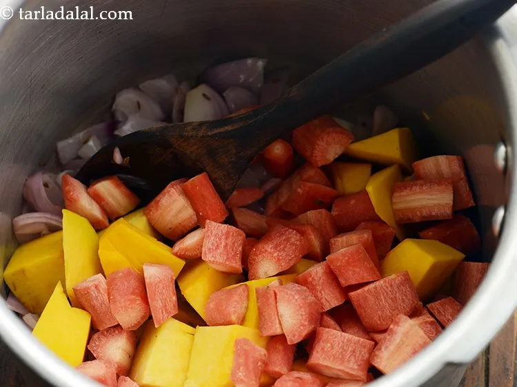 Step 9 – Also, add the carrot. Both kaddu and gajar are high in beta carotene.