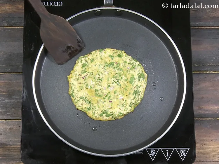 Step 36 – Cook the adai on one side.&nbsp;