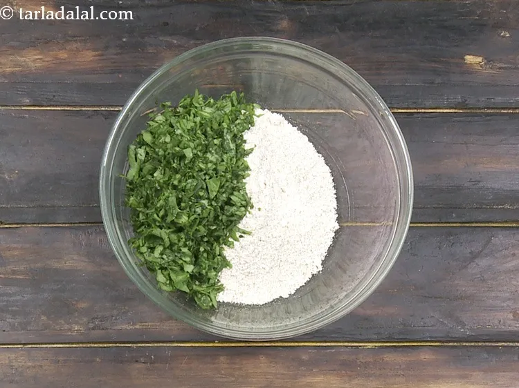 Step 17 – Add 1/2 cup&nbsp;finely&nbsp;<a href="https://www.tarladalal.com/glossary-chopped-spinach-780i">chopped spinach (palak)</a>.