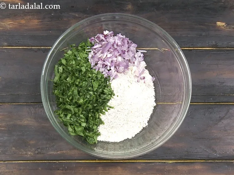 Step 18 – Add 1/4 cup&nbsp;finely&nbsp;<a href="https://www.tarladalal.com/glossary-chopped-onions-722i">chopped onions</a>.