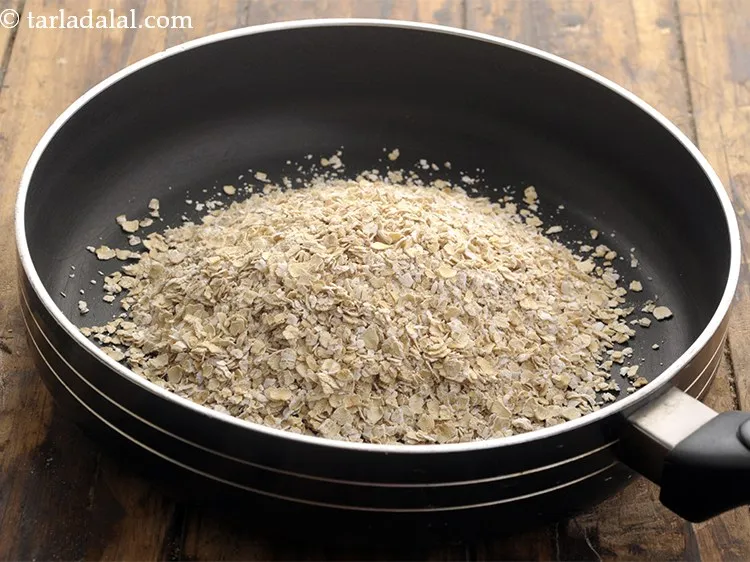 Step 9 – Place <meta charset="UTF-8" />1 cup&nbsp;<a href="glossary-quick-cooking-rolled-oats-rolled-oats-547i">quick cooking rolled oats</a> in a broad non-stick pan.&nbsp;