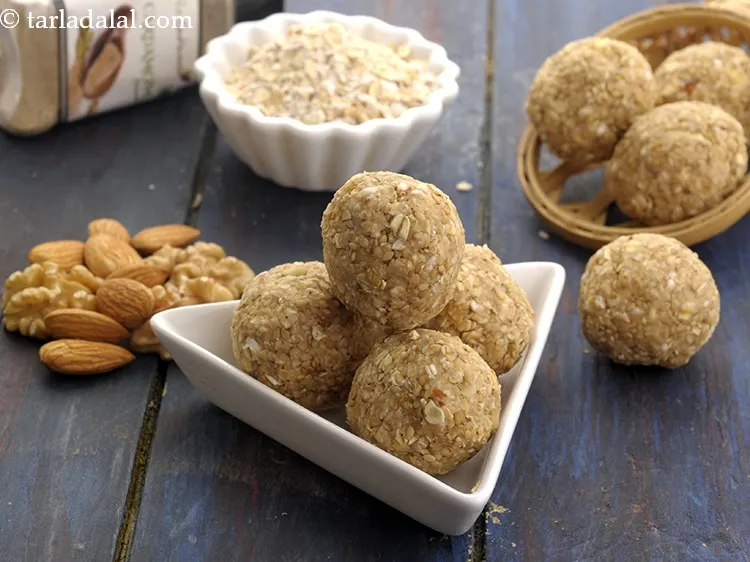 Step 27 – Serve <strong>oats and mixed nuts ladoo</strong> immediately. Else these <strong>oats laddu</strong> might dry up or …