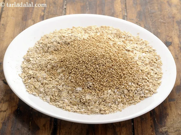 Step 14 – Remove them on a plate with oats and allow them to cool completely as well.&nbsp;