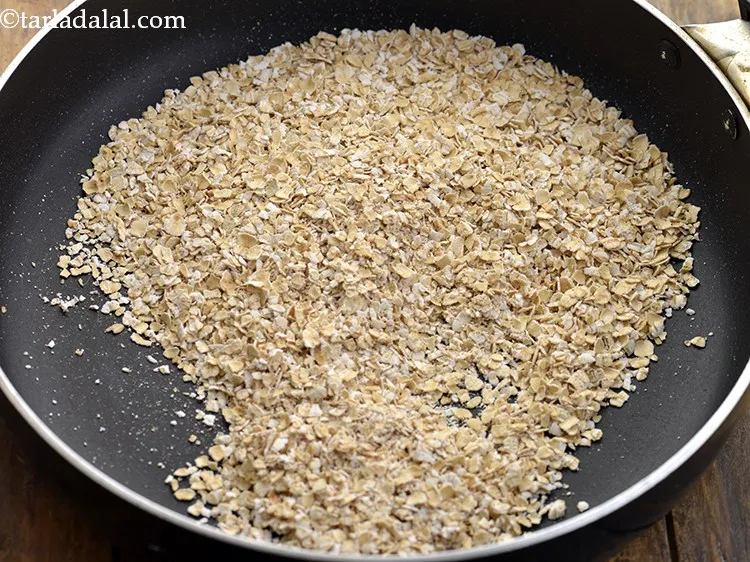 Step 2 – To prepare the<strong>&nbsp;roasted poha and oats chivda recipe | healthy oats chivda | how to …