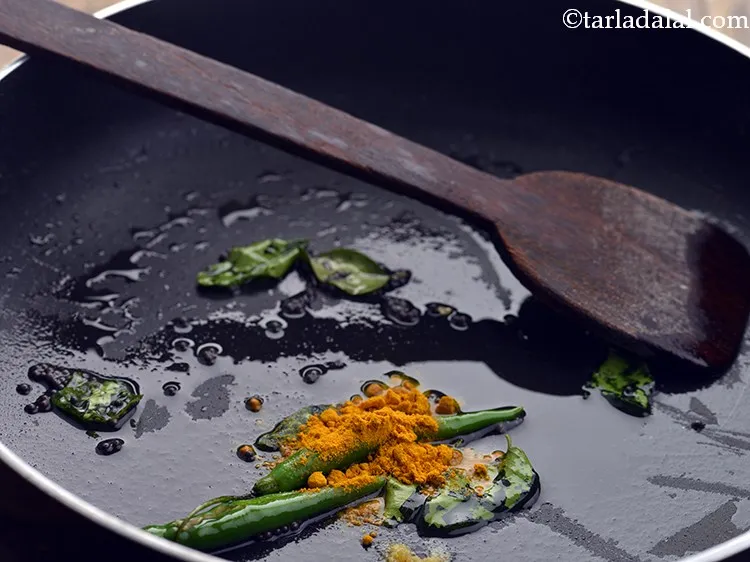 Step 12 – Add turmeric powder and saut&eacute; on a medium flame for a few seconds. To enhance …