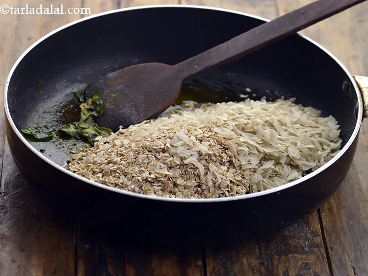 Step 13 – Add the oats and poha.&nbsp;
