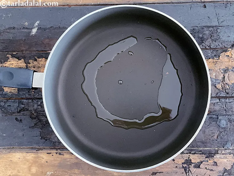 Step 11 – <html><head><meta charset="UTF-8"></head><body><p>Heat 2 tsp olive oil or &nbsp;<a href="glossary-oil-671i">oil</a>&nbsp;in a deep non-stick pan. <span style="color:rgb(0,0,0);">Olive …