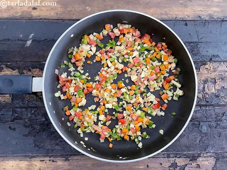 Step 21 – <p>Sauté on a medium flame for another 2 minutes.</p>