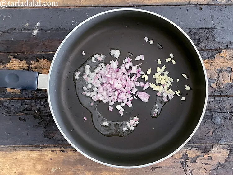 Step 13 – <html><head></head><body><p>Add&nbsp;2 tsp&nbsp;finely&nbsp;<a href="glossary-chopped-garlic-790i">chopped garlic (lehsun)</a>.</p></body></html>