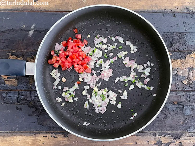 Step 16 – <html><head></head><body><p>Add&nbsp;2 tbsp&nbsp;finely&nbsp;<a href="glossary-chopped-tomatoes-779i">chopped tomatoes</a>.&nbsp;Tomatoes&nbsp;are extremely rich source of&nbsp;<a href="https://www.tarladalal.com/recipes-for-Lycopene-Diet-1175">Lycopene</a>. Tomatoes are a powerful antioxidant, super …