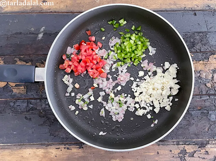 Step 18 – <html><head></head><body><p>Add&nbsp;2 tbsp&nbsp;finely&nbsp;<a href="glossary-chopped-cauliflower-796i">chopped cauliflower</a>.</p></body></html>