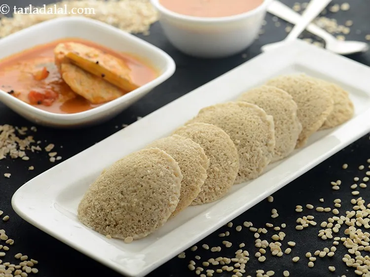 Step 22 – Serve <strong>oats idli</strong> immediately with <a href="https://www.tarladalal.com/Sambhar-(-How-To-Make-Sambhar-South-Indian-Recipe)-32735r" target="_blank">sambhar</a>. The regular idli is made with urad …