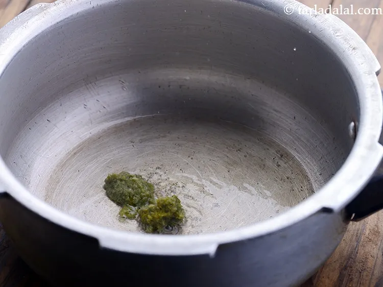 Step 9 – Once the oil is hot, add the green chili paste. If preparing for kids, skip …