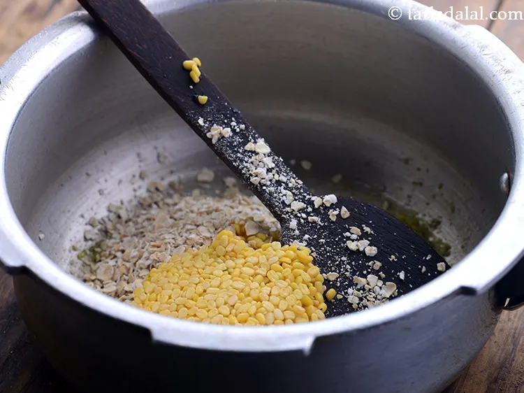 Step 14 – Add yellow moong dal to make <strong>oats moong dal khichdi</strong>. You can replace yellow moong …