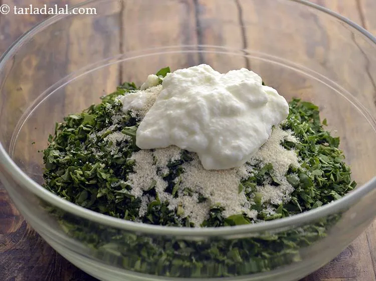 Step 6 – Add curd to keep the <strong>oats methi muthia</strong> soft.