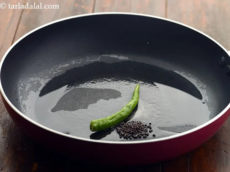 Step 12 – Add green chilli.