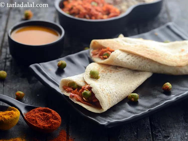 Step 33 – Serve <strong>oats mutter dosa </strong>immediately with sambar.