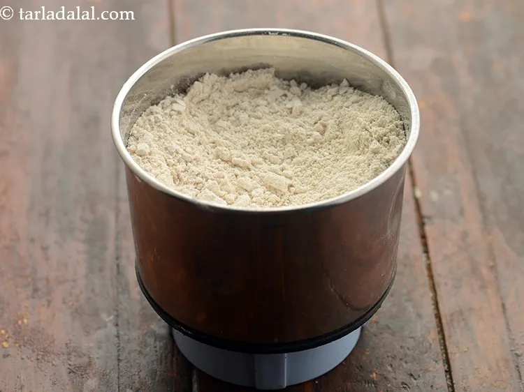 Step 5 – Blend in a mixer to a fine powder for <strong>oats mutter dosa</strong>.