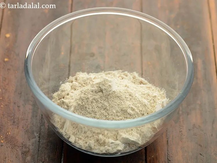 Step 6 – Transfer the prepared oats-urad dal mixture to a deep bowl.