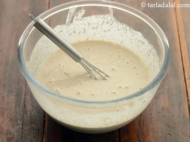 Step 8 – Mix well to make a smooth, lump-free batter of pouring consistency for <strong>mixed vegetable oats …