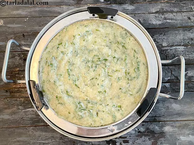 Step 26 – Keep aside to cool for 3 to 4 minutes and cut into diamond shaped equal …