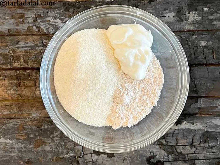 Step 7 – Add 1/4 cup <a href="https://www.tarladalal.com/glossary-low-fat-curds-low-cal-dahi-low-calorie-curd-low-fat-yogurt-1107i" target="_blank">low fat curd (dahi)</a>.